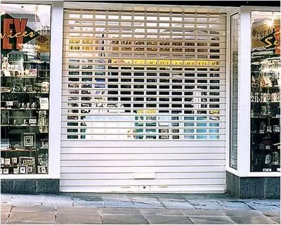 Rolling slatted doors